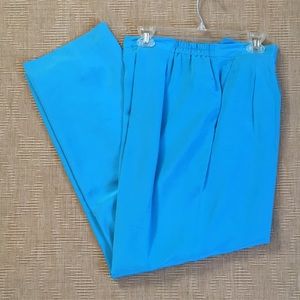 Turquoise silk pants.